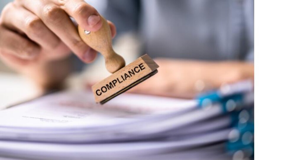 Een stempel met daarop: compliance